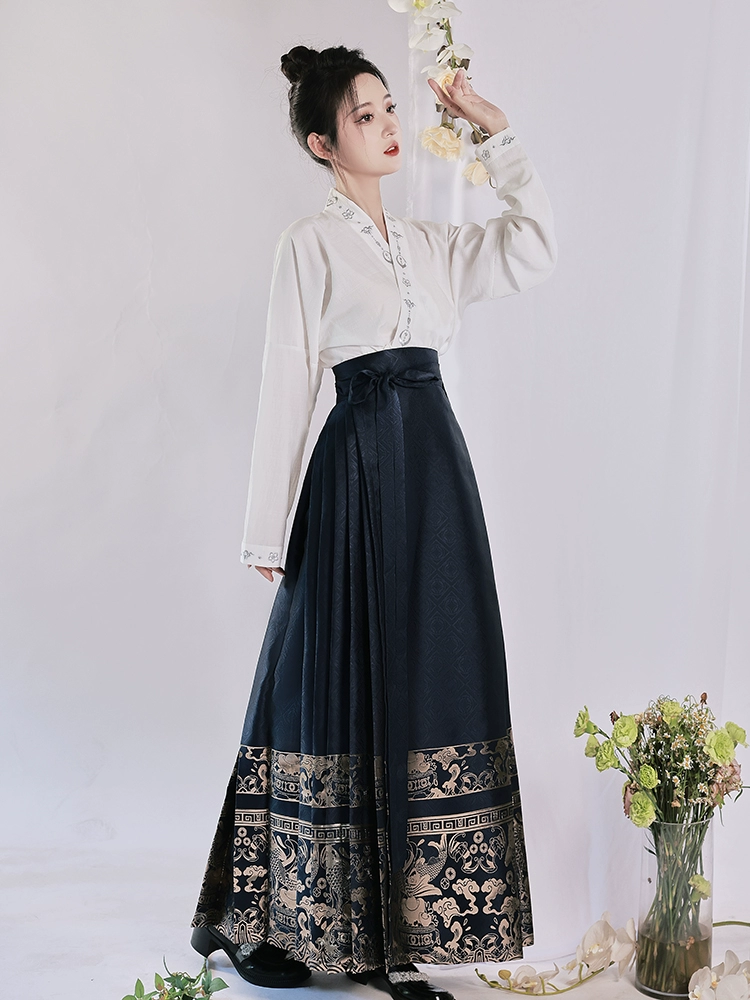 Deep blue brocade mamian skirt in modern Chinese-style aesthetics.