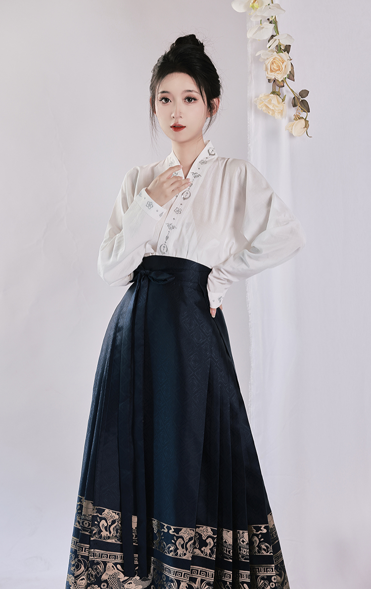 Deep blue brocade mamian skirt in modern Chinese-style aesthetics.